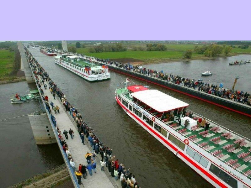 Boats on a river with crowds