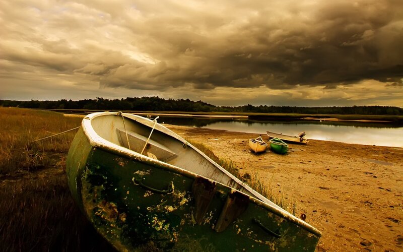 Boats on a stormy shore