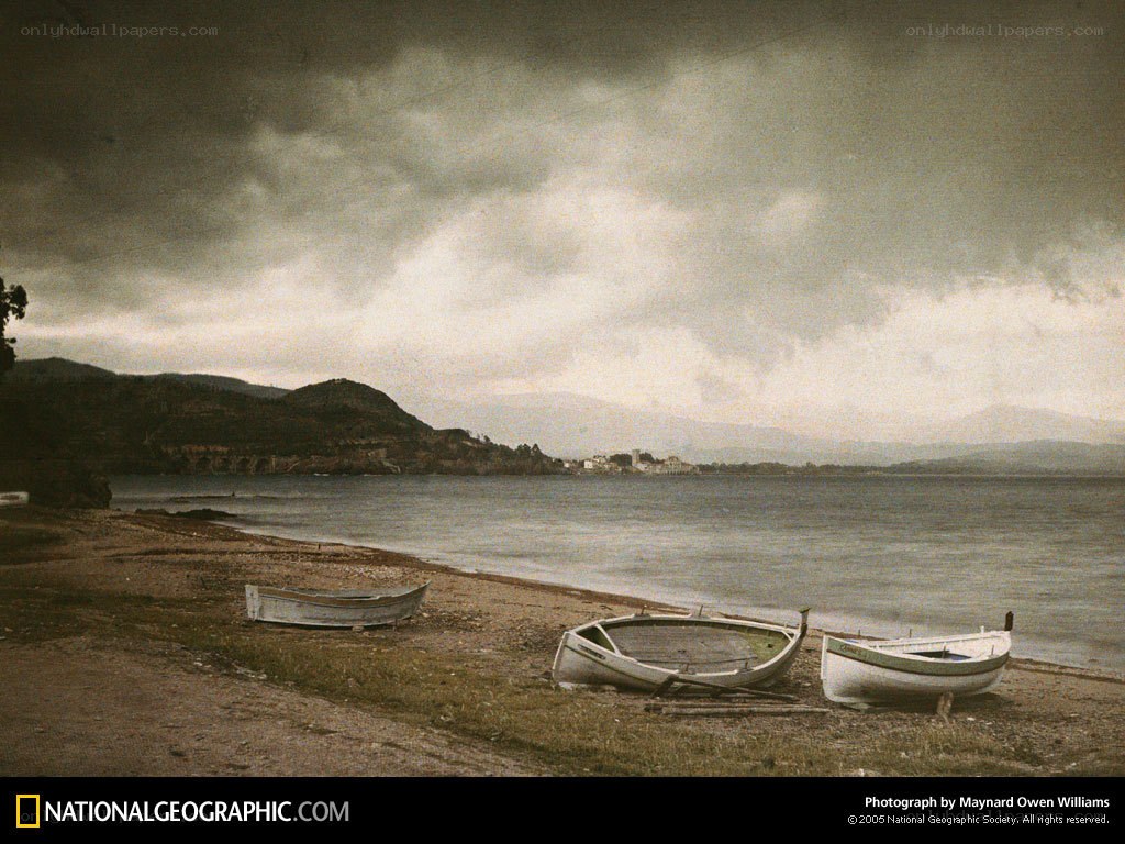 Boats on a stormy shore