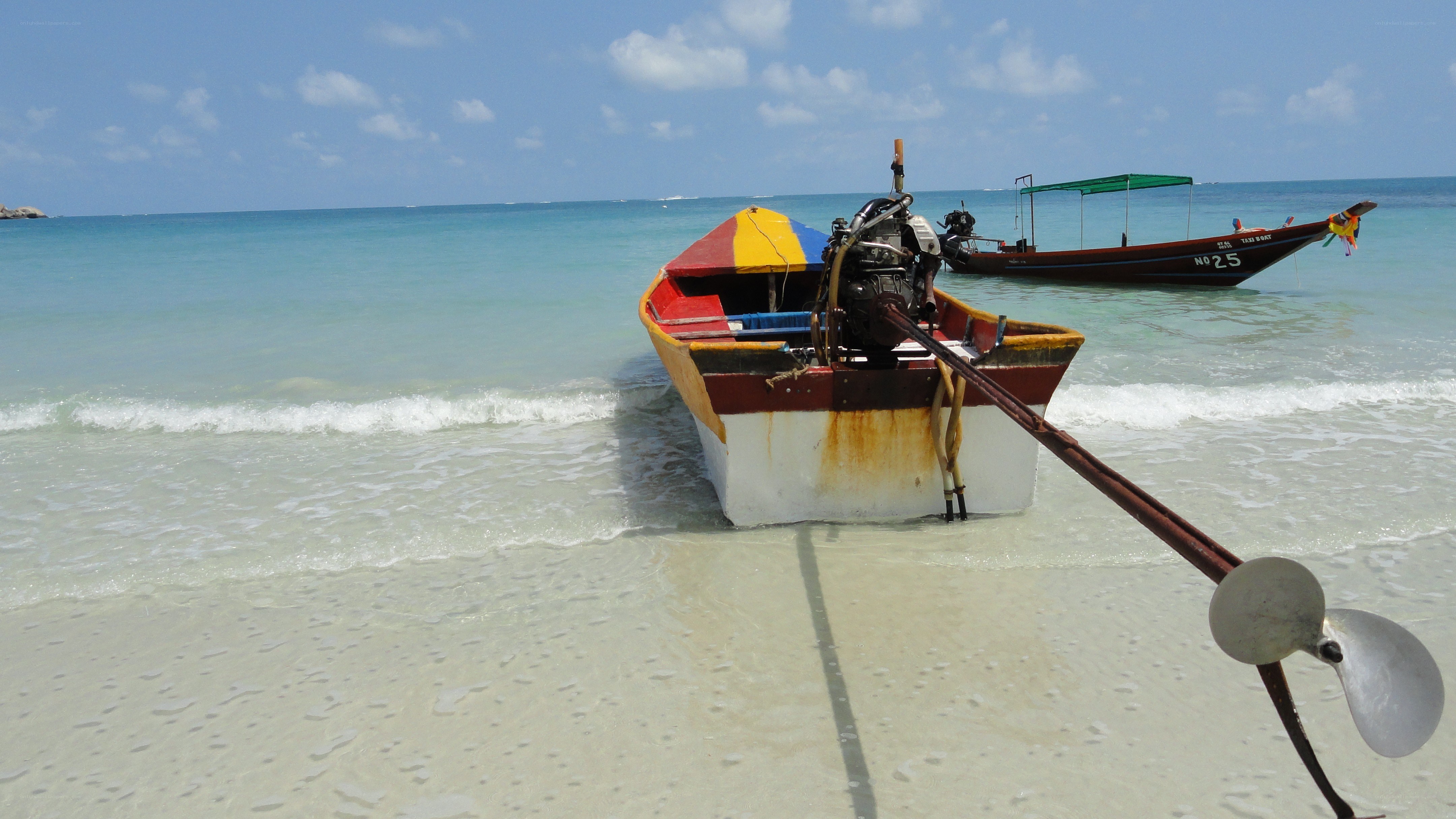 Boats on a tropical beach