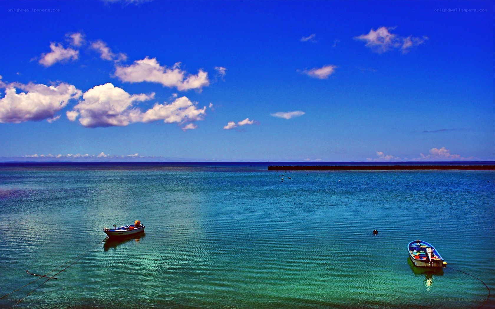 Boats on calm blue sea