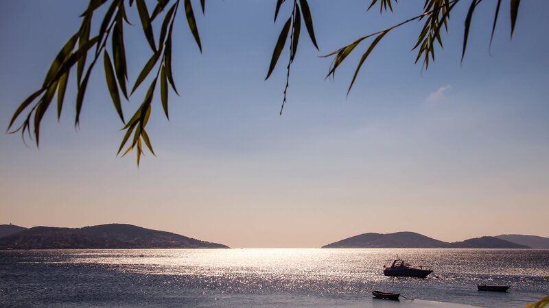 Boats on Calm Water — Blue, Serene, Sunset, Photograph, Trees, Hills