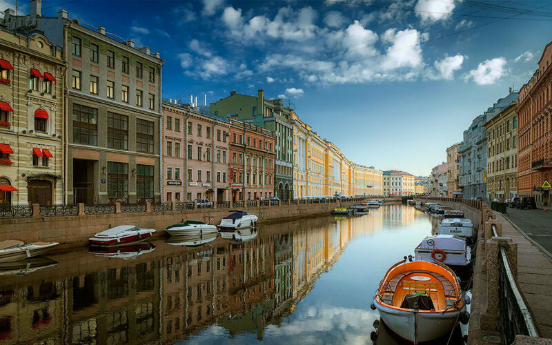 Boats on Canal in City — Blue