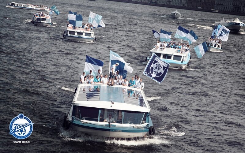 Boats with Fans on River
