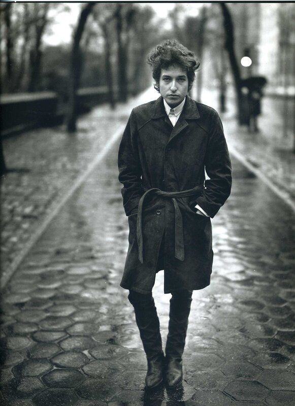 Bob Dylan on a wet city street