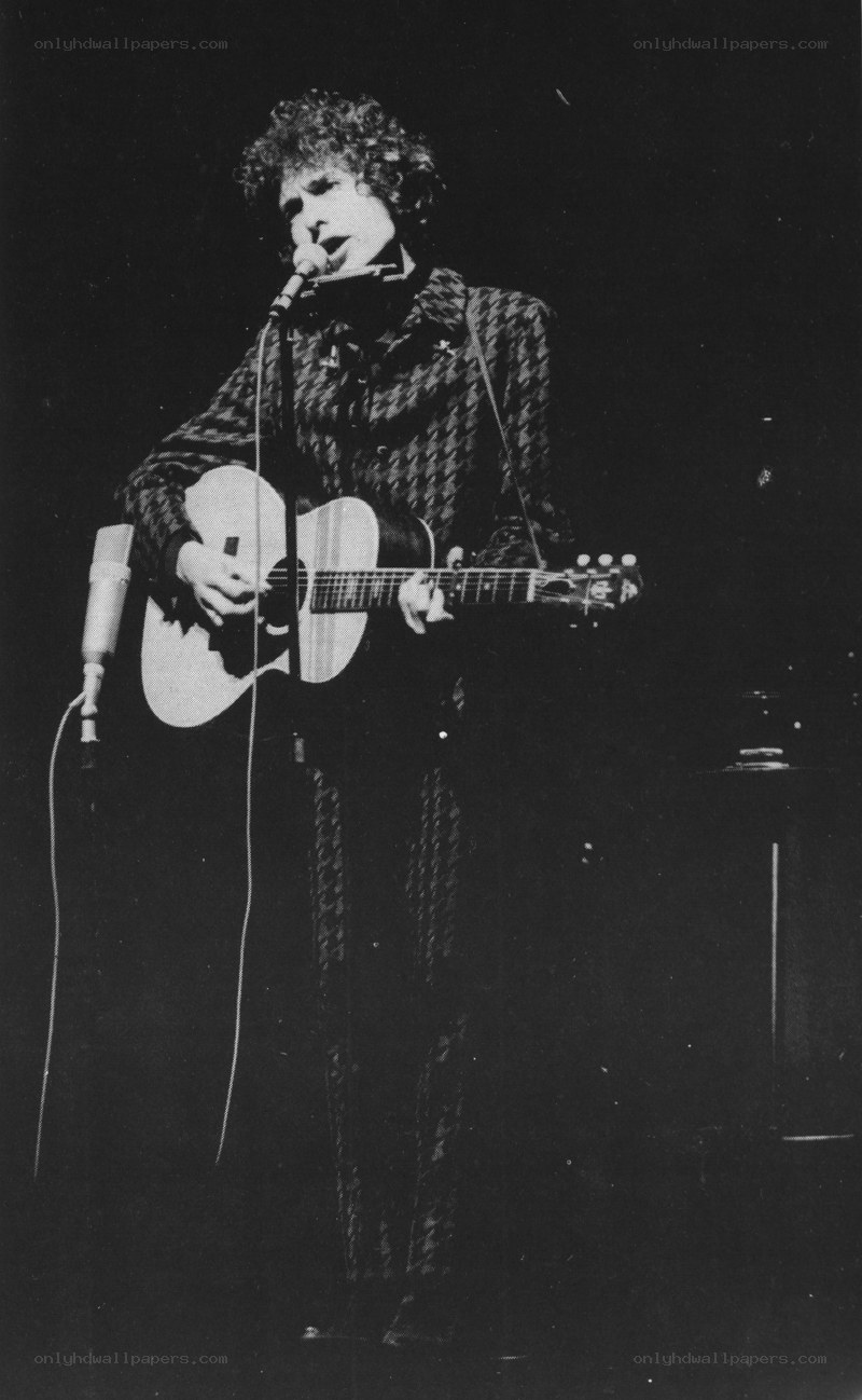Bob Dylan performing on stage