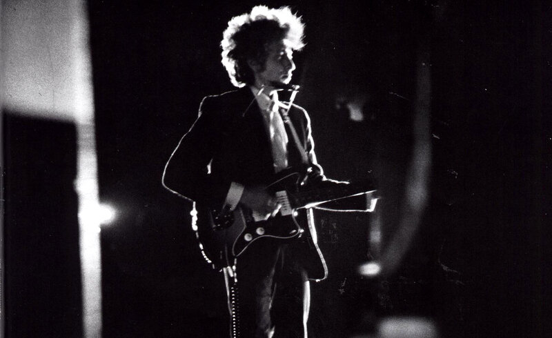 Bob Dylan performing on stage