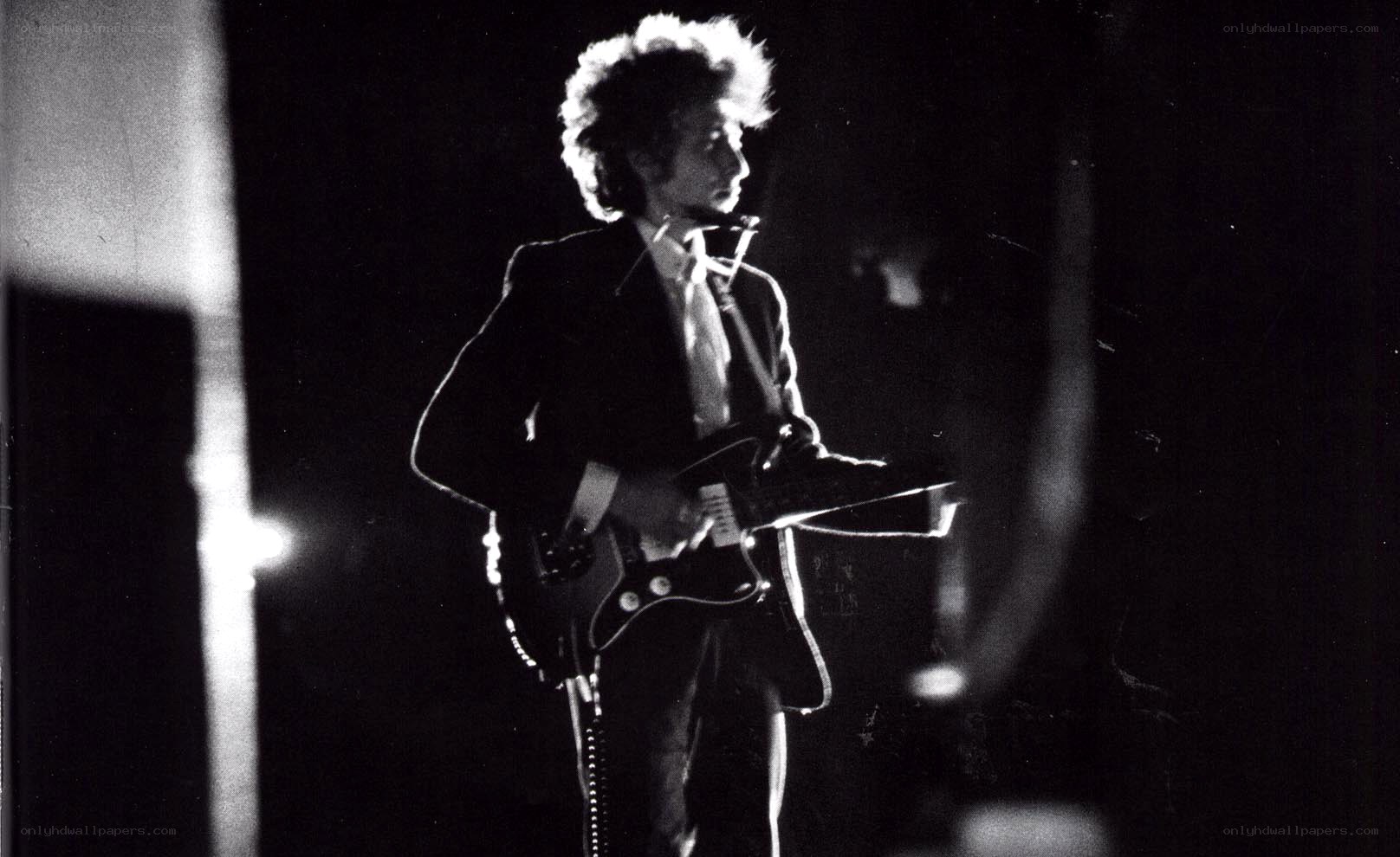 Bob Dylan performing on stage
