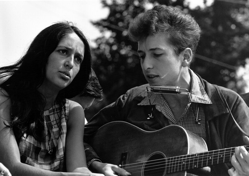 Bob Dylan playing guitar with a woman