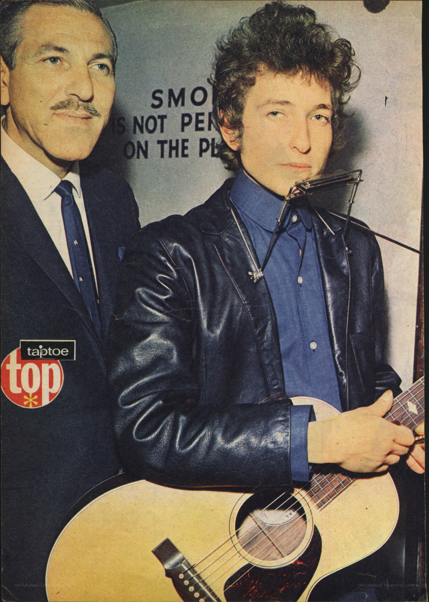 Bob Dylan with a man in suit