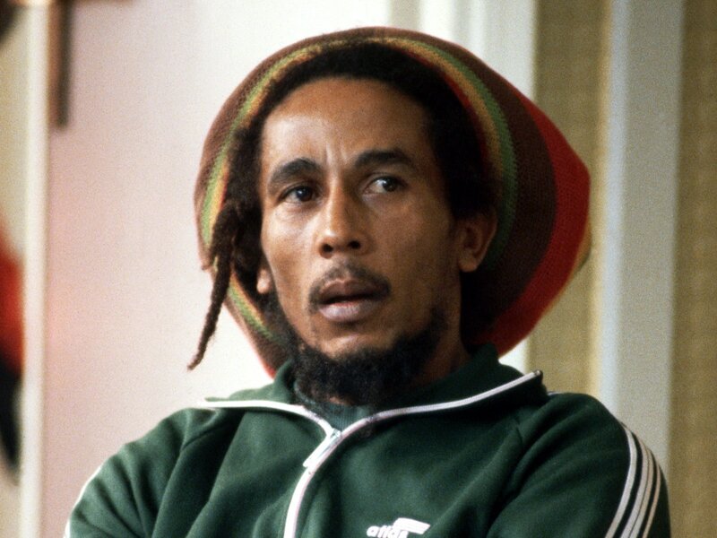 Bob Marley in a green tracksuit