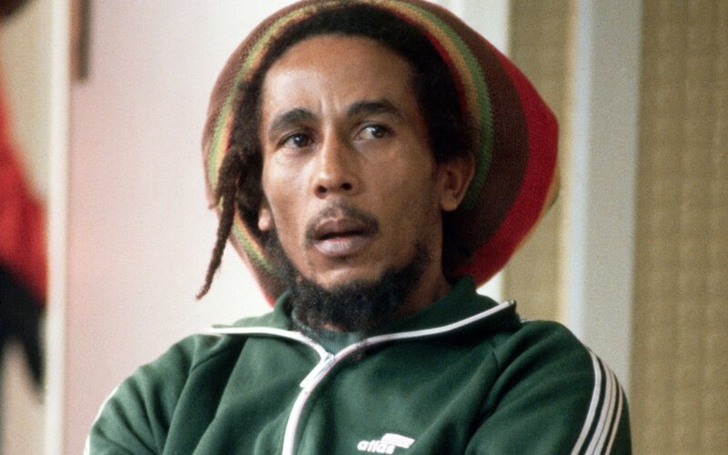 Bob Marley in a green tracksuit