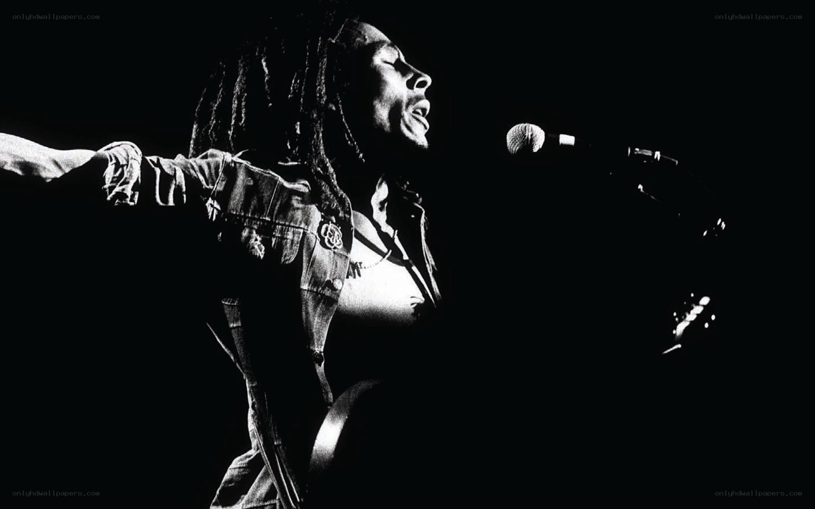 Bob Marley singing on stage