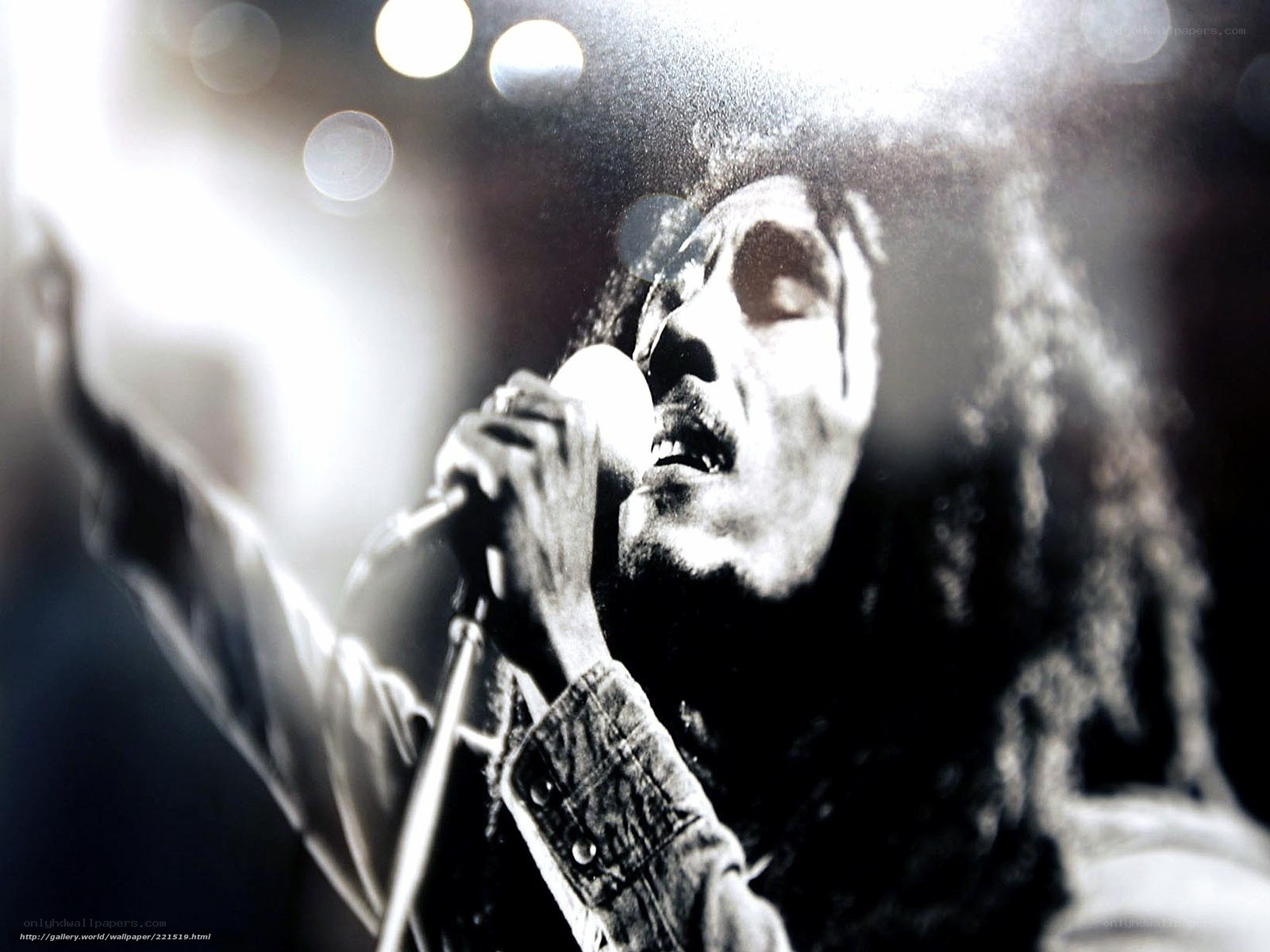Bob Marley singing on stage