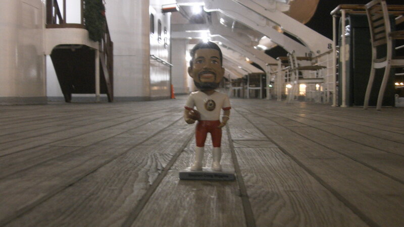 Bobblehead Figure on Deck
