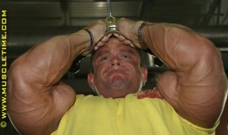 bodybuilder exercising at gym