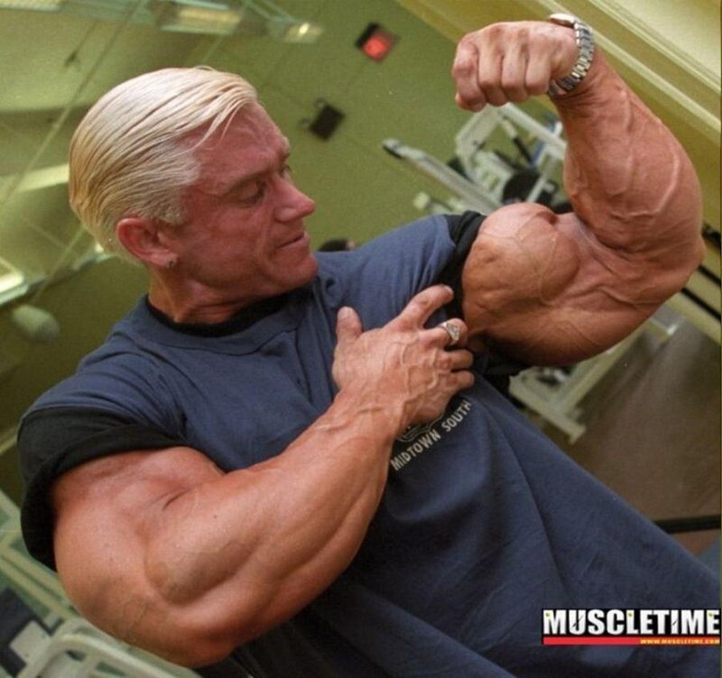 bodybuilder flexing arms