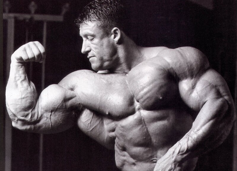 Bodybuilder Posing — Black, Dramatic, Photograph