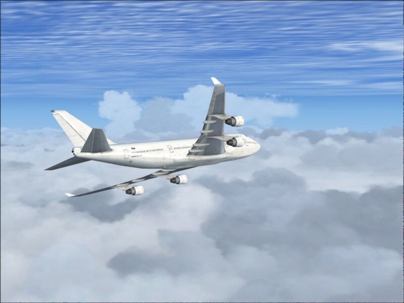 Boeing 747 flying above clouds