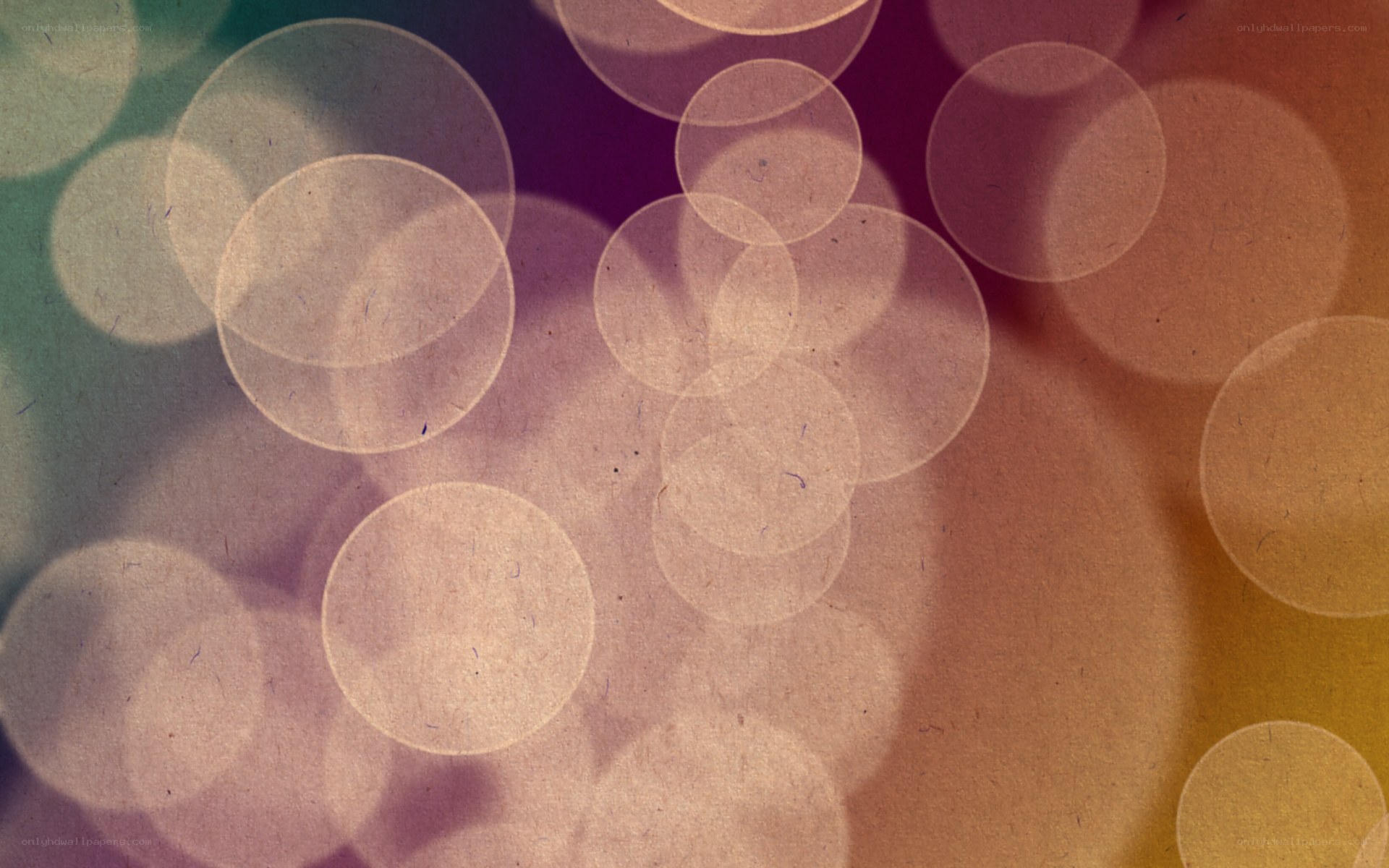 bokeh circles on textured paper