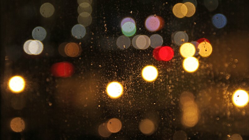 Bokeh Lights on Wet Glass — Yellow, Dark