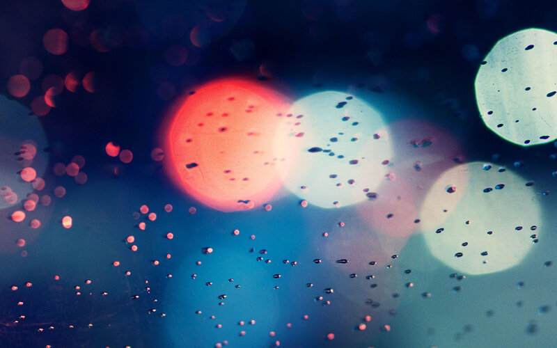 bokeh lights through raindrops