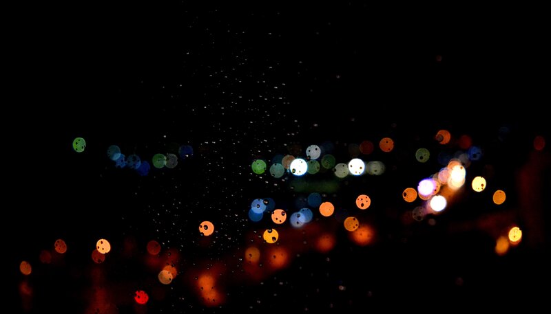 Bokeh Lights Through Raindrops — Black