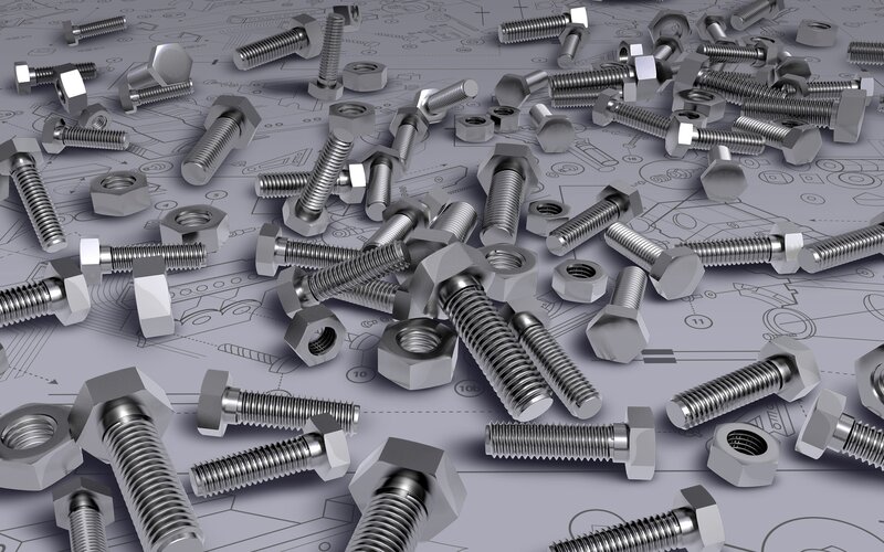Bolts and nuts on blueprint