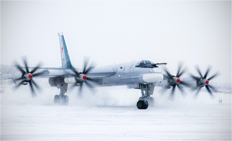 Bomber aircraft on snowy runway