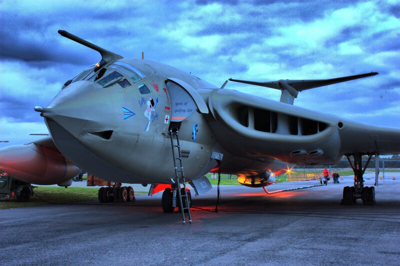 Bomber aircraft on tarmac at dusk
