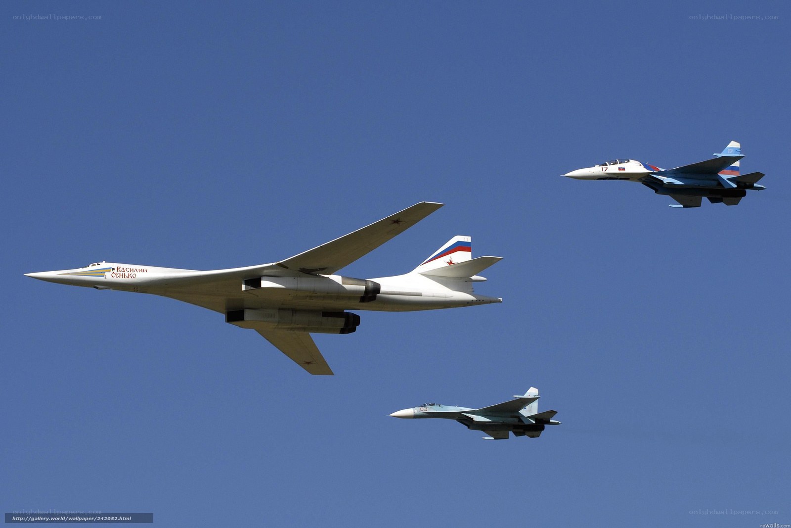 Bomber and fighter jets in formation