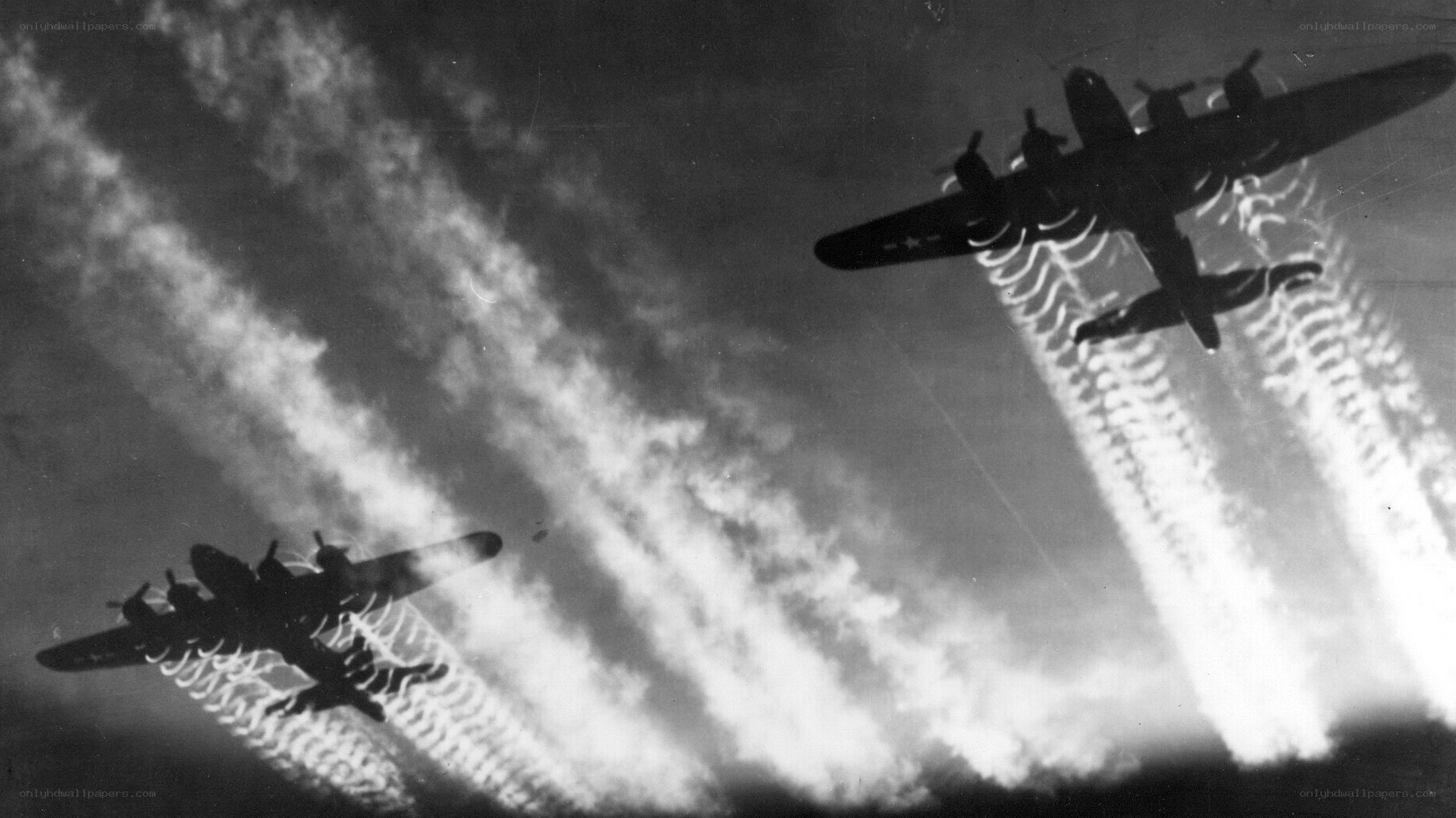 Bombers in formation with contrails
