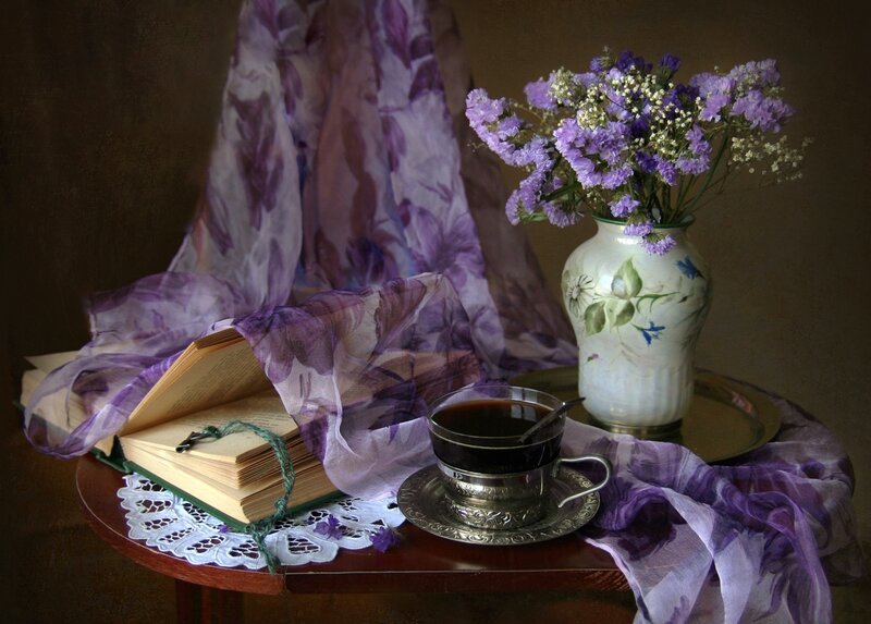 Book and Flowers on Table — Purple