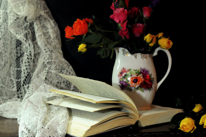 book and flowers still life