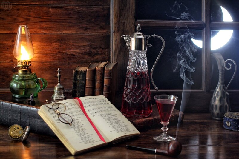 Book and Lamp on Table