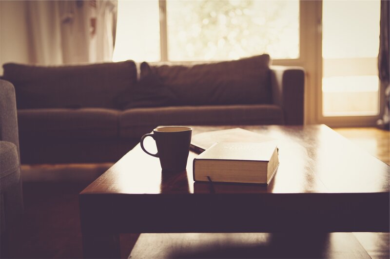 Book and Mug on Table