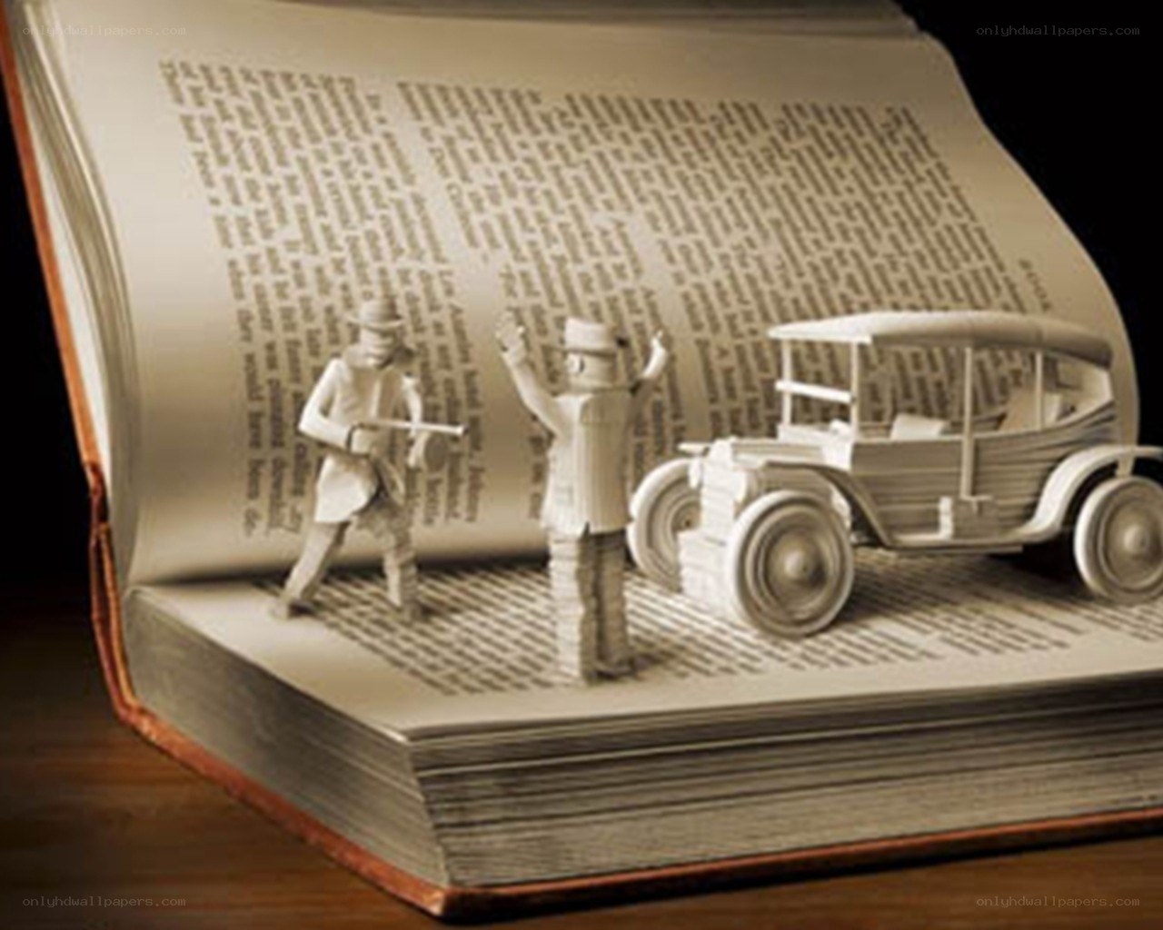 book art with paper figures