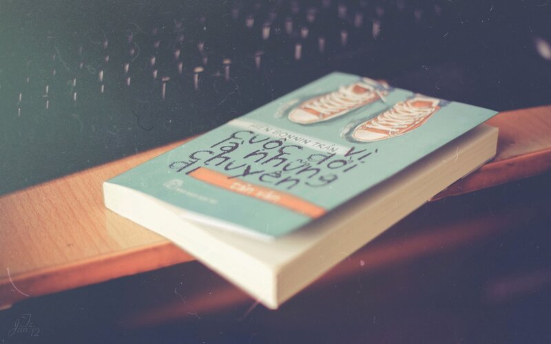 Book on Wooden Surface — Teal