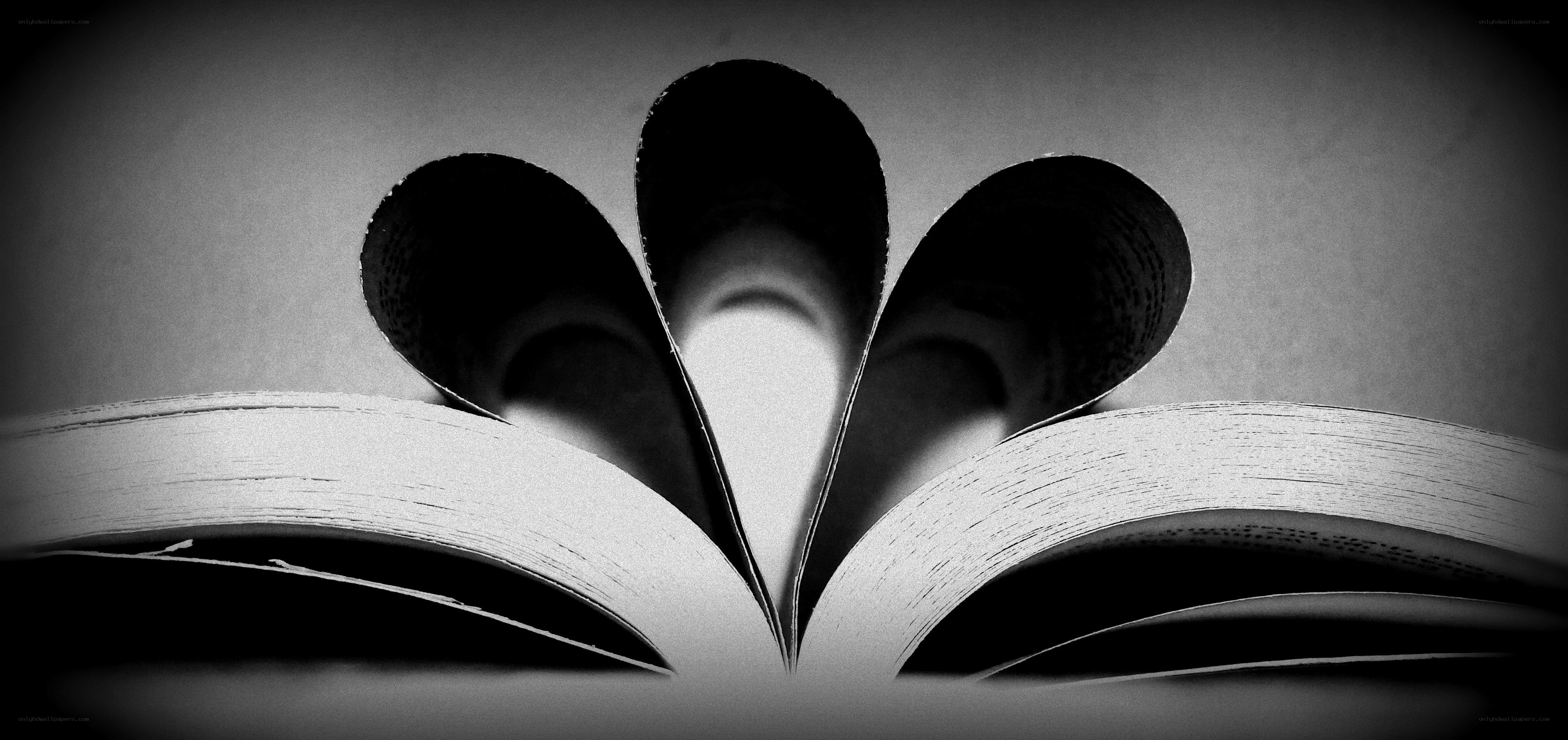 book pages folded into a heart