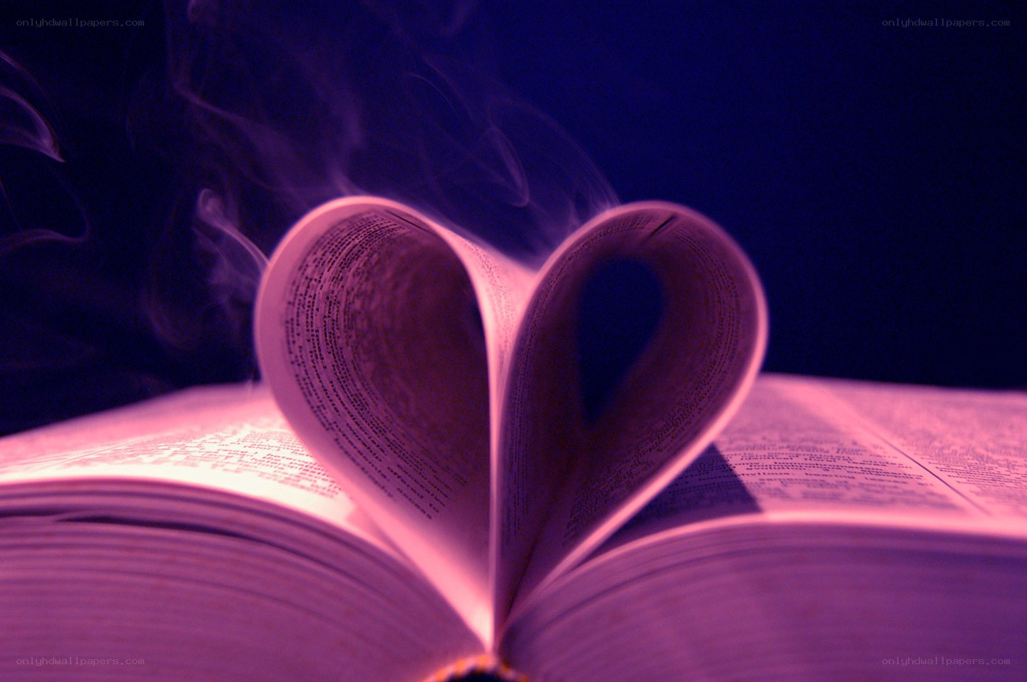 book pages folded into a heart
