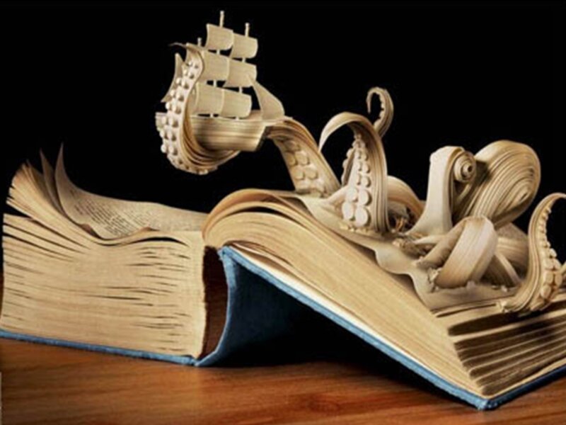 book sculpture of octopus and ship