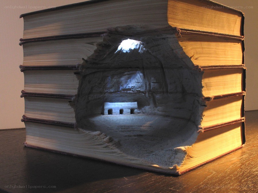 book sculpture with cave interior