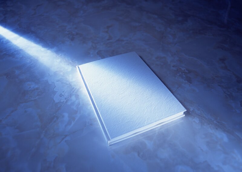 book under blue light