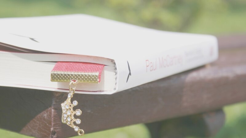 book with crown bookmark