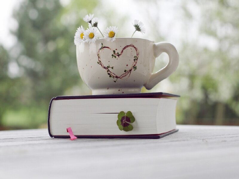 Book with Cup and Flowers