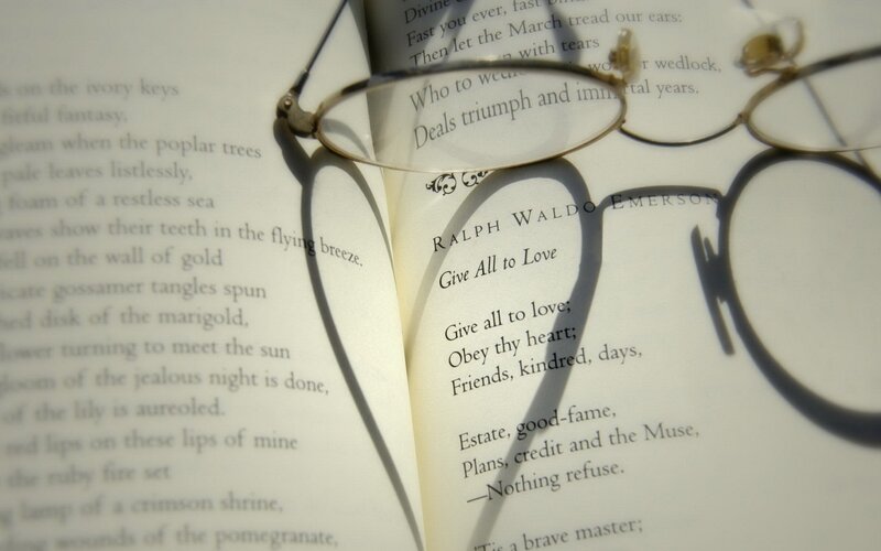 Book with glasses and poem