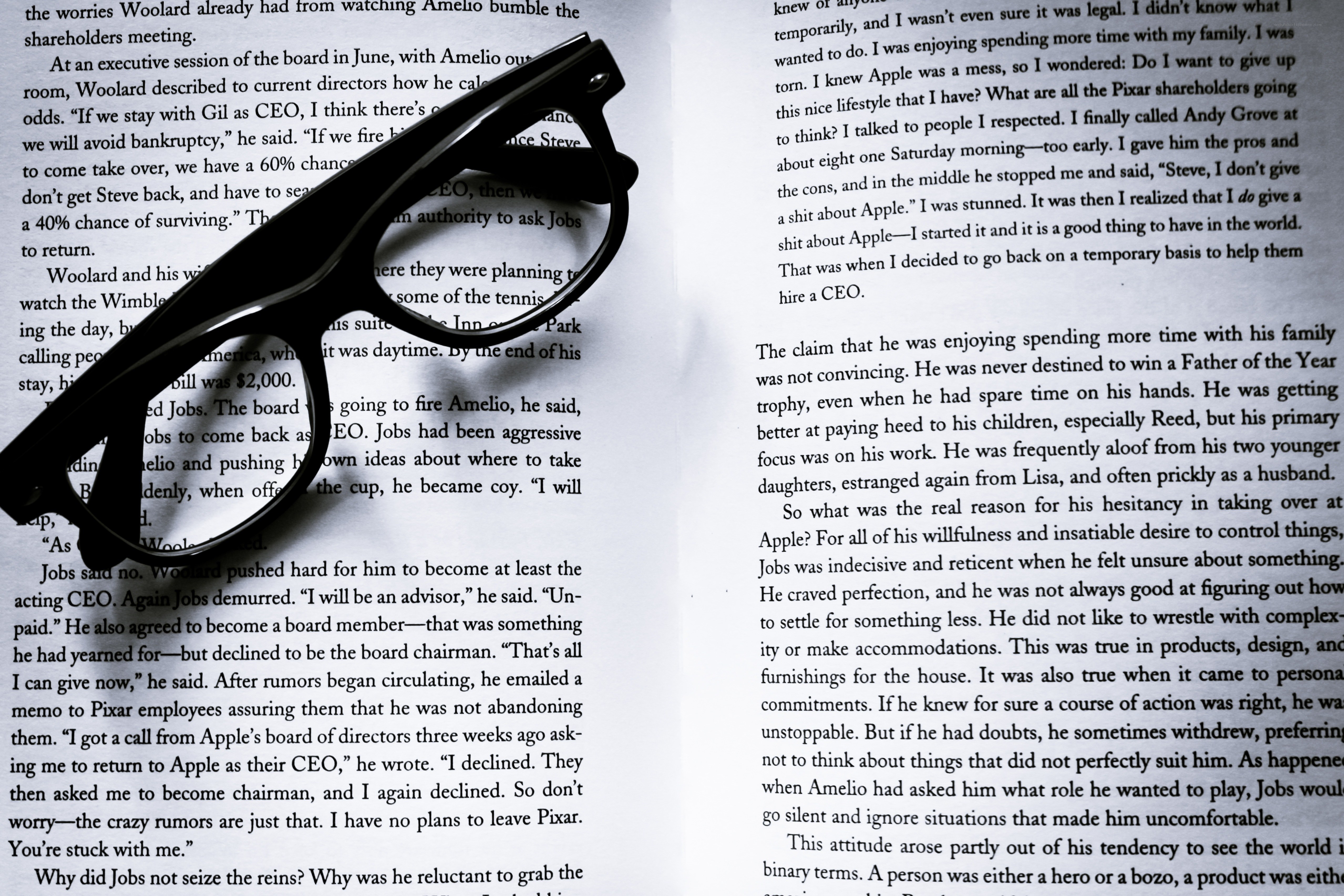 book with glasses on pages