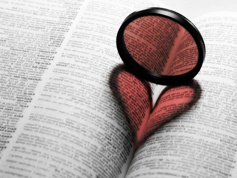 Book with Magnifying Glass
