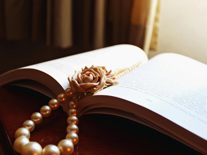 Book with Pearl Necklace