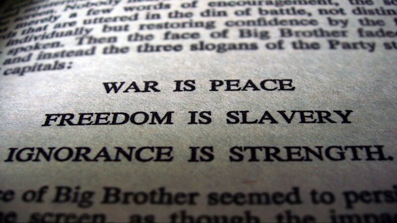 book with propaganda slogans